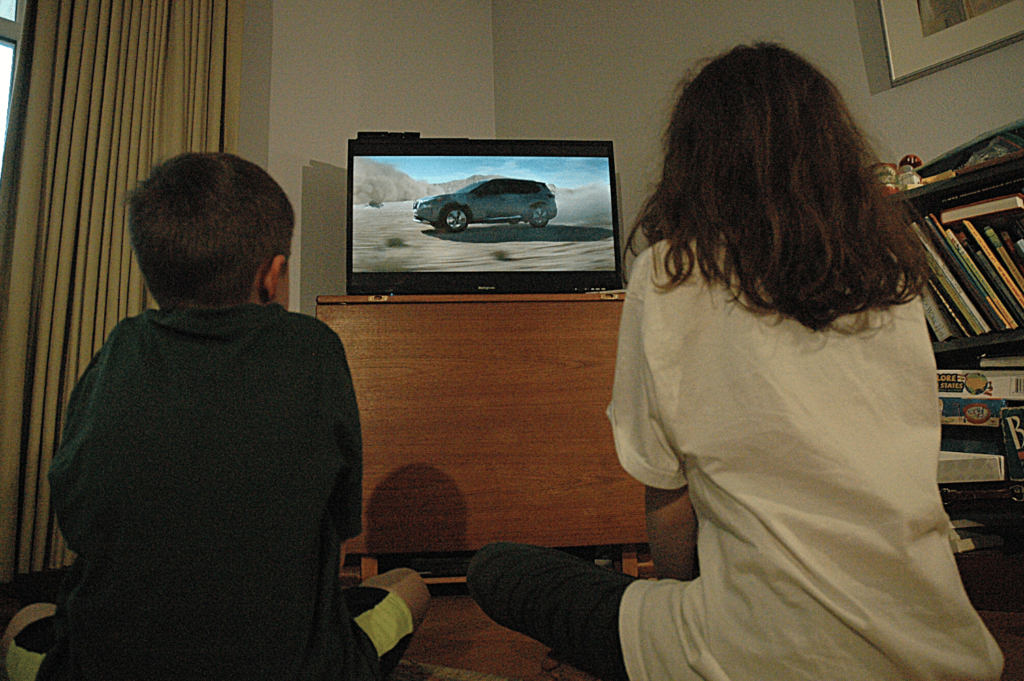 Kids watching TV ads