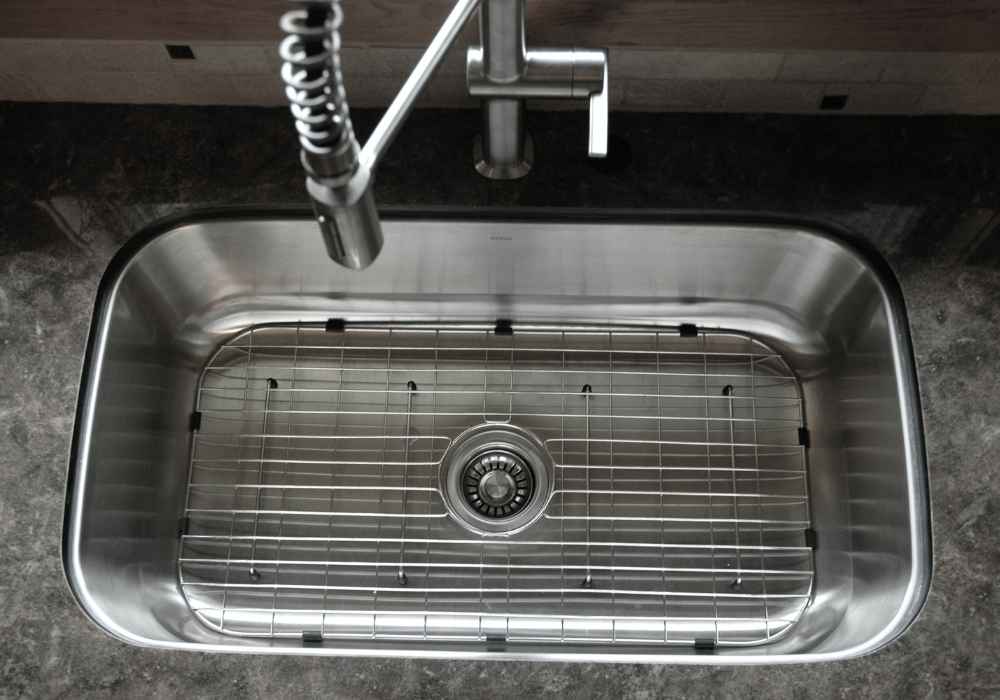 Completed sink project, converting sink from a dual drain setup into a single drain setup.